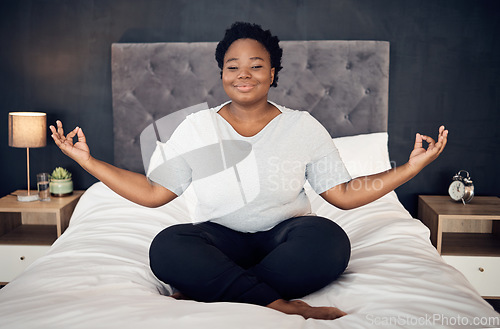Image of Yoga, lotus and portrait of black woman on bed for meditation, mindfulness or exercise. Pilates, workout or person in bedroom for zen, relax and plus size body for health, wellness or fitness at home