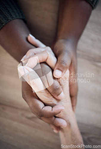 Image of Holding hands, support closeup and help, trust with people and counseling, top view with psychology and pray together. Kindness, respect and worship, therapy and wellness with communication and care