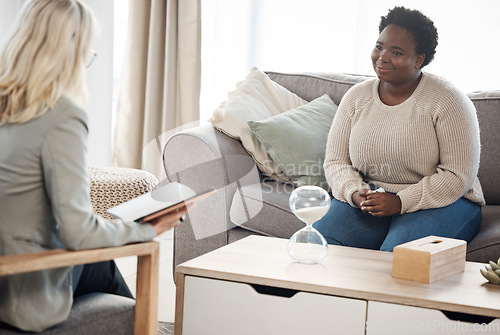 Image of Woman, therapy patient and notebook for counseling, psychology evaluation and mental health support or helping. Life coach, professional therapist or doctor listening to client and people consulting