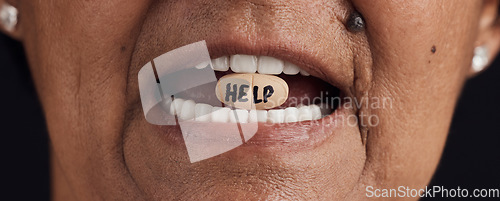 Image of Mental health, psychology and old woman mouth with tablet for help, stress or psychiatric balance in studio. Depression, anxiety and senior lady with medicine, capsule or ptsd pills, trauma or crisis