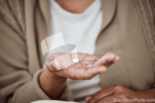 Image of Closeup, woman and pill with health, medicine and wellness with recovery, healing and fever. Zoom, female person and girl with medication, sick and treatment for disease, illness and cure for cold