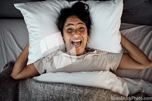 Image of Screaming, above and a woman in bed with mental health, stress or bipolar. Sad, anxiety and an awake senior person with portrait, insomnia and anger in the bedroom in the morning while shouting