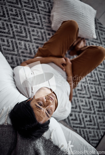 Image of Old woman, depression and mental health, sad and tired with psychology, stress and life crisis with grief at home. Top view of female person, thinking about a problem, burnout and retirement or pain