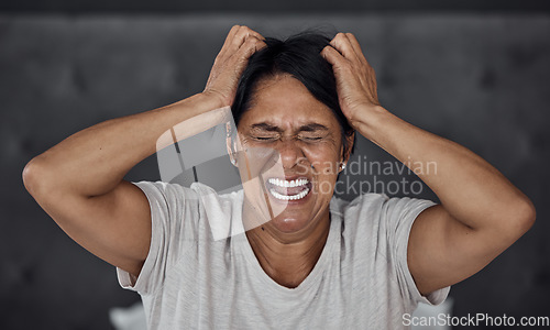 Image of Shouting, stress and elderly woman in bed with insomnia, vertigo or menopause in her home. Screaming, headache and senior lady frustrated with anxiety, depression or mental health crisis in bedroom