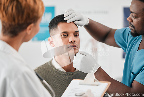 Image of Doctor, nurse and patient, healthcare and test with people in hospital, check vitals with wellness in medicine. Medical exam, men and woman in clinic, checklist with health insurance and consultation