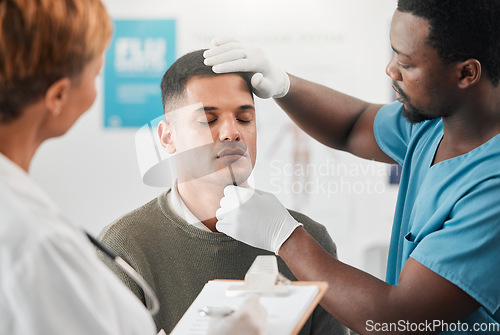 Image of Doctor, nurse and patient, healthcare and assessment with people in hospital, check vitals with wellness. Medical exam, men and woman in clinic, checklist with health insurance and consultation