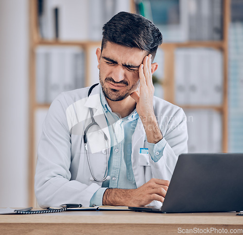 Image of Man, doctor and headache in stress, debt or mistake from burnout, pain or deadline at the hospital. Frustrated male person or medical employee in anxiety, depression or mental health at the clinic