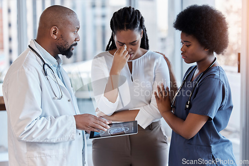 Image of Sad, medical and tablet with doctor and woman in hospital for results, consulting or empathy. Medicine, healthcare and bad news with man and patient report in african clinic for nurse, help or advice