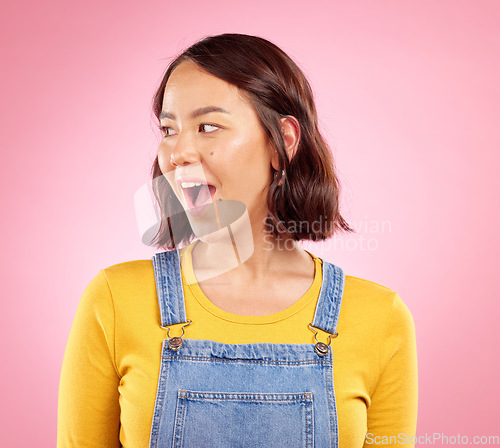 Image of Wow, shock and surprise woman in studio with excited face for deal announcement, sale or promo on pink background. Happy facial expression, giveaway or notification for asian girl in casual fashion.