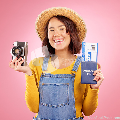 Image of Photographer woman, passport and studio portrait for travel, memory or excited by pink background. Gen z student girl, retro camera and identity documents for compliance for international immigration