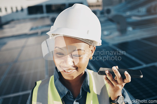 Image of Happy black woman, solar panel and speaker phone call for photovoltaic plate, sustainability or project voice note. Energy grid, cellphone or face of female engineer listening to eco friendly advice