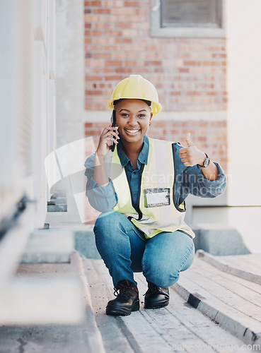 Image of Phone call, portrait black woman, construction worker and thumbs up for HVAC machine, heat pump or AC repair service. Feedback, cellphone or rooftop technician person vote, aircon success or approval