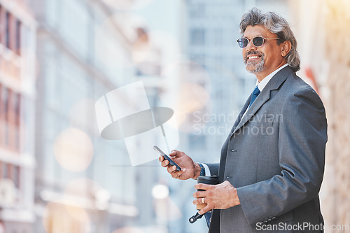 Image of Senior, business man and smartphone in city, travel and commute, bokeh and communication outdoor. Mexican male executive, CEO using phone on journey to work and urban street with mockup space