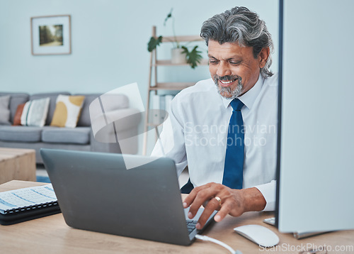 Image of Business man, laptop and work from home, online or finance management and typing report in living room. Computer, research and happy professional person, executive or entrepreneur in financial career