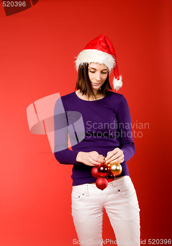 Image of Shy Female with Christmas Decorations