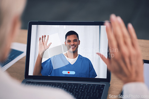 Image of Man, doctor and laptop for video call, virtual meeting or online consultation at the hospital. Male person, medical or healthcare professional waving hello on computer for consulting or Telehealth