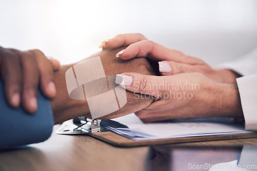 Image of Cancer, support and doctor holding hands of patient for care, kindness and hope. Comfort, medical professional and person consulting for wellness, healthcare and empathy, help and therapy in hospital