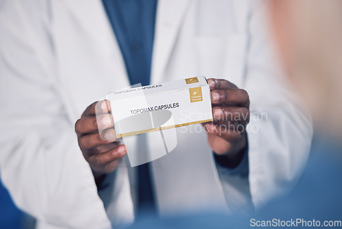 Image of Doctor, hands and box of medication for patient, healthcare or consultation at the pharmacy or clinic. Closeup of male person or medical professional consulting customer with pills or pharmaceuticals