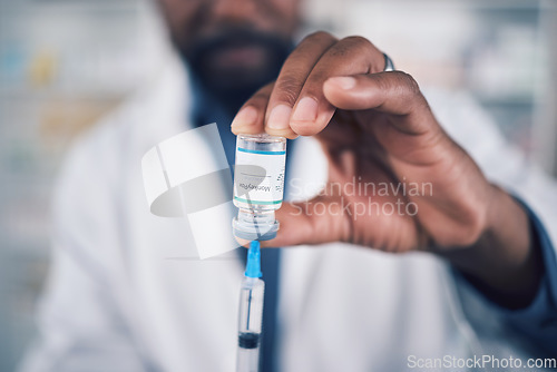 Image of Closeup of hand, doctor and vaccine, injection and container with medicine, healthcare and safety from virus. Person, liquid drugs and syringe with glass vial or bottle, pharmaceutical and health