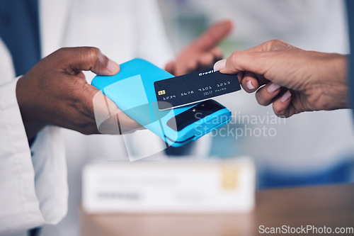 Image of Pharmacist, hands and credit card on pos for payment, medication or buying healthcare product at pharmacy. Closeup of customer making purchase or transaction for pharmaceutical drugs or pills at shop