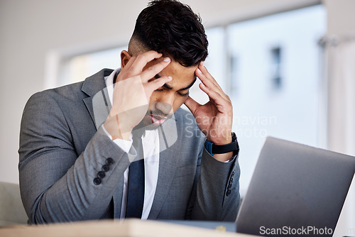 Image of Stress, laptop and headache with business man in office for anxiety, tax and burnout. Mental health, glitch and tired with lawyer and legal research in law firm for frustrated, confused and fatigue