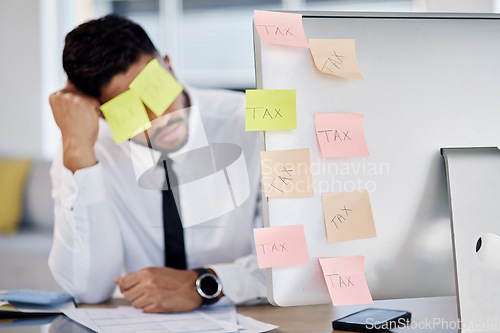 Image of Stress, man and tax with sticky note on face with computer for accountant at company with debt. Work, tired and business man with online audit or burnout and frustrated with reminder or deadline