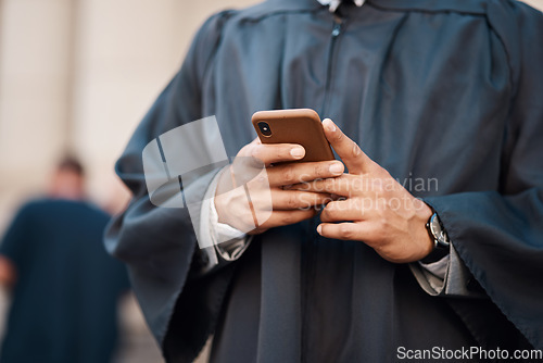 Image of Lawyer, hands and cellphone with judge for justice at courtroom in city for communication or research. Tech, legal and advice with advocate for consulting on mobile app for client with an attorney.