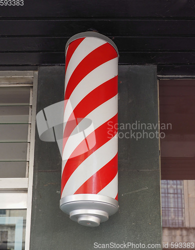 Image of Red and white barber sign