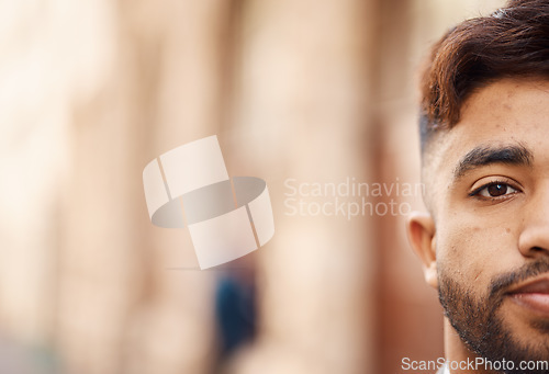 Image of Half portrait, mockup and serious businessman in city for travel, work and business. Space, corporate and a banner of the face of a young corporate worker in town for career advertising with bokeh