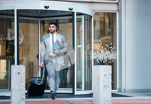 Image of Businessman outside office, suitcase and travel for lawyer at law firm for work commute. Folder, luggage and man on sidewalk, attorney with documents at on city street at court building on urban walk