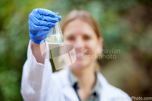 Image of Forest, sample and professional scientist test water for research or inspection of the ecosystem and environment study. Science, sustainable and woman environmentalist doing carbon footprint exam