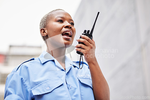 Image of Walkie talkie, woman and security guard with radio outdoor for safety, justice and call backup. Black female police officer, bodyguard and contact audio communication for crime watch and surveillance