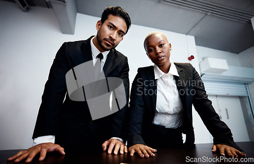 Image of Police detective, man and woman in interrogation room, portrait and together with teamwork for information. Government agent, face and investigation for legal questions, law and justice to stop crime