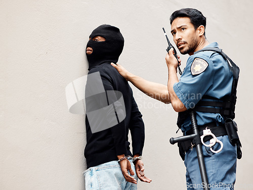 Image of Man, police and walkie talkie with criminal for arrest, crime or justice in theft, robbery or violence. Male person, officer or security guard with handcuffs and force on suspect and calling backup