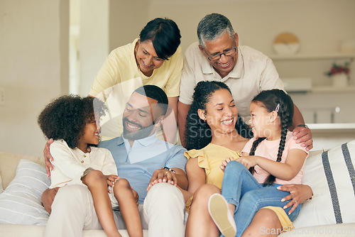 Image of Parents, kids and happy big family in home for love, care and quality time together. Mother, father and grandparents relax with young children in living room in support, smile and bond of generations