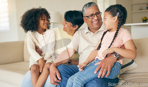 Image of Grandparents, children and smile on sofa in home for love, care and quality time together. Grandmother, grandfather and happy young kids relax on couch for bond, support and fun in family living room