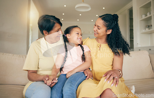 Image of Family, grandmother and mom with child on sofa for happy bond, talking and love at home together, Hug, conversation and girl with mama or women on couch in living room for mothers day and support
