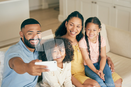 Image of Family, home selfie and children with parents on social media, online memory and bond together on sofa. Happy biracial kids and girl or mother and father in profile picture or photography for holiday