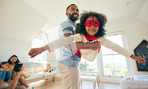 Image of Superhero flight, father and happy kid playing pretend game, imagine flying and enjoy quality time together, fun or bond. Action hero, Halloween fantasy costume and family dad and child play at home