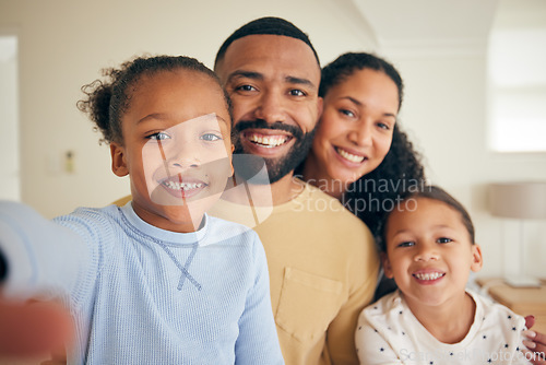 Image of Face of parents, children and happy for selfie in home for love, care and quality time together. Portrait of mother, father and young kids smile to capture profile picture for memory in family house