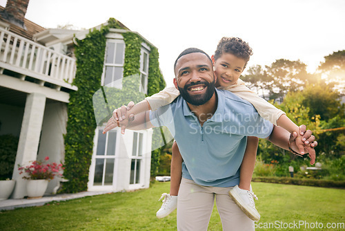 Image of Father, child and piggyback outdoor or garden for real estate happiness, celebration and game at new house. Dream home, freedom and excited child with dad on lawn running and flying on property