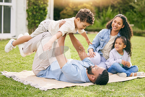 Image of Picnic, airplane and happy family relax, play or enjoy outdoor quality time together, flying games and nature fun. Summer freedom, backyard and bonding dad, mom and kids imagine plane flight in park