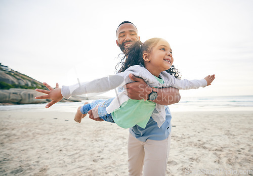 Image of Love, airplane and father with girl child at the beach with freedom, smile and bonding in nature together. Happy, flying and parent with kid at the sea for fun, games and travel, holiday or trip