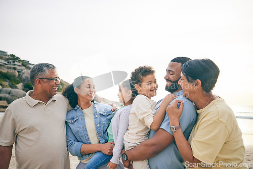 Image of Family, grandparents and parents with kids at the beach, happiness and bonding on a happy holiday. Love, care and smile, men and women with children outdoor, summer vacation and relax by the sea