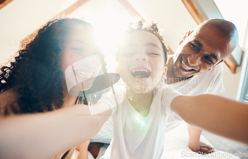 Image of Funny, family and face selfie in home, bonding and laughing together with lens flare. Portrait, happy and girl with father, mother and parents taking profile picture for memory, social media and love