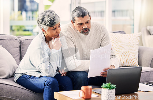 Image of Old couple, laptop and retirement paperwork, life insurance with finance investment and together at home. People do taxes online, pension policy documents and budget, serious woman and man with bills