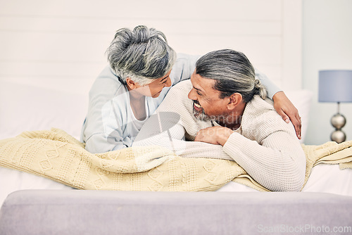 Image of Funny, playful or old couple in bedroom to relax, enjoy romance or morning time together at home. Hugging, silly senior woman or happy elderly man laughing or bonding with love or smile in retirement