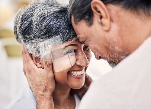 Image of Laughing, forehead or happy old couple in living room with love, care or joy bonding together on holiday. Eye contact, elderly man or senior woman in celebration for romance in retirement at home