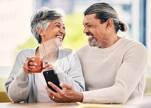 Image of Senior couple, smartphone and coffee for laugh, comic meme or funny video on web, blog or internet in morning. Mature man, woman and cellphone for social network app, online comedy or bonding in home