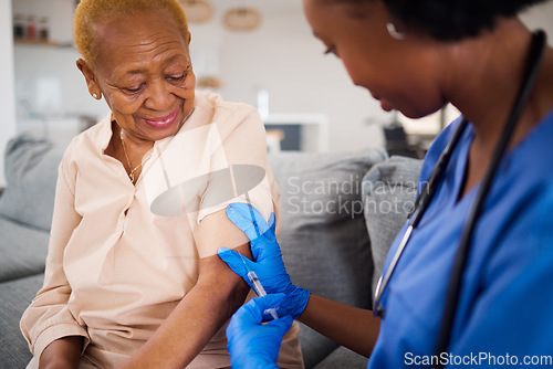 Image of Healthcare, black woman and doctor for a home vaccine, virus safety and security from covid. Smile, medicine and and African nurse with a senior patient and giving a vaccination during a consultation